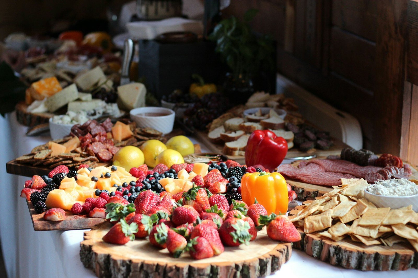 Cured meat and cheese board on a rustic table